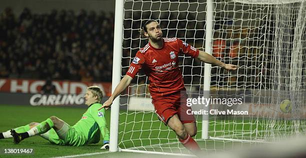 Andy Carroll of Liverpool celebrates his goal during the Barclays Premier League match between Wolverhampton Wanderers and Liverpool at Molineux on...