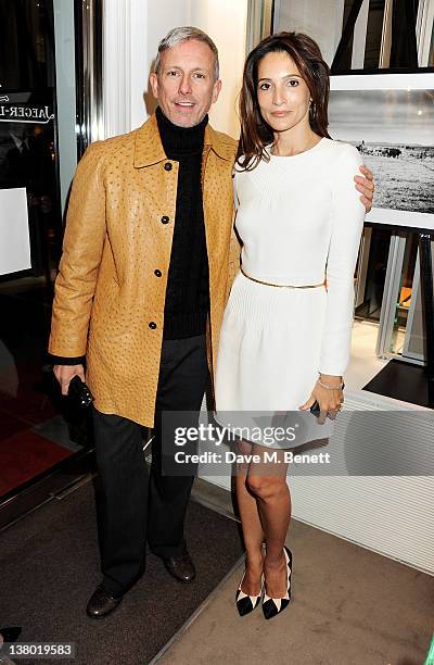 Patrick Cox and Astrid Munoz attend a private viewing of "Gaucho", a photographic exhibition by Astrid Munoz, at the Jaeger-LeCoultre Boutique on...