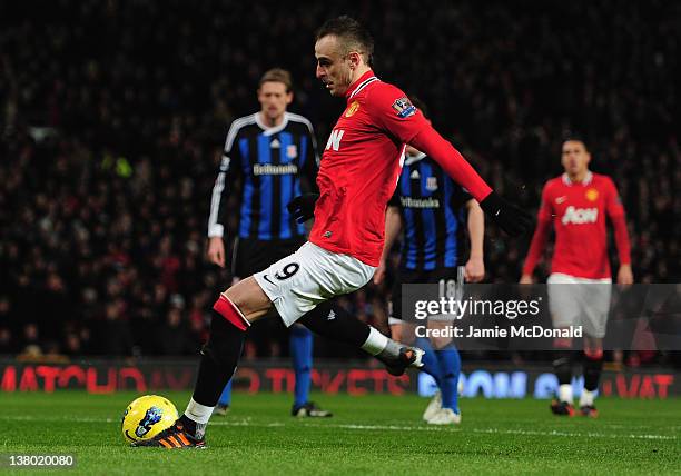 Dimitar Berbatov of Manchester United scores a goal during the Barclays Premier League match between Manchester United and Stoke City at Old Trafford...