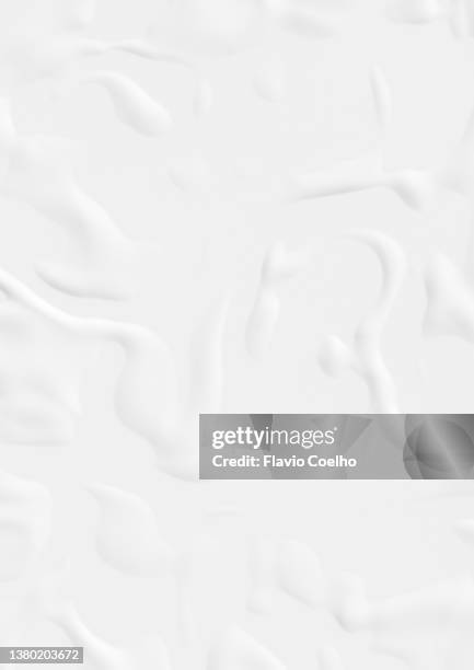 paper poster glued on surface with bumpy air bubbles - collant description physique photos et images de collection