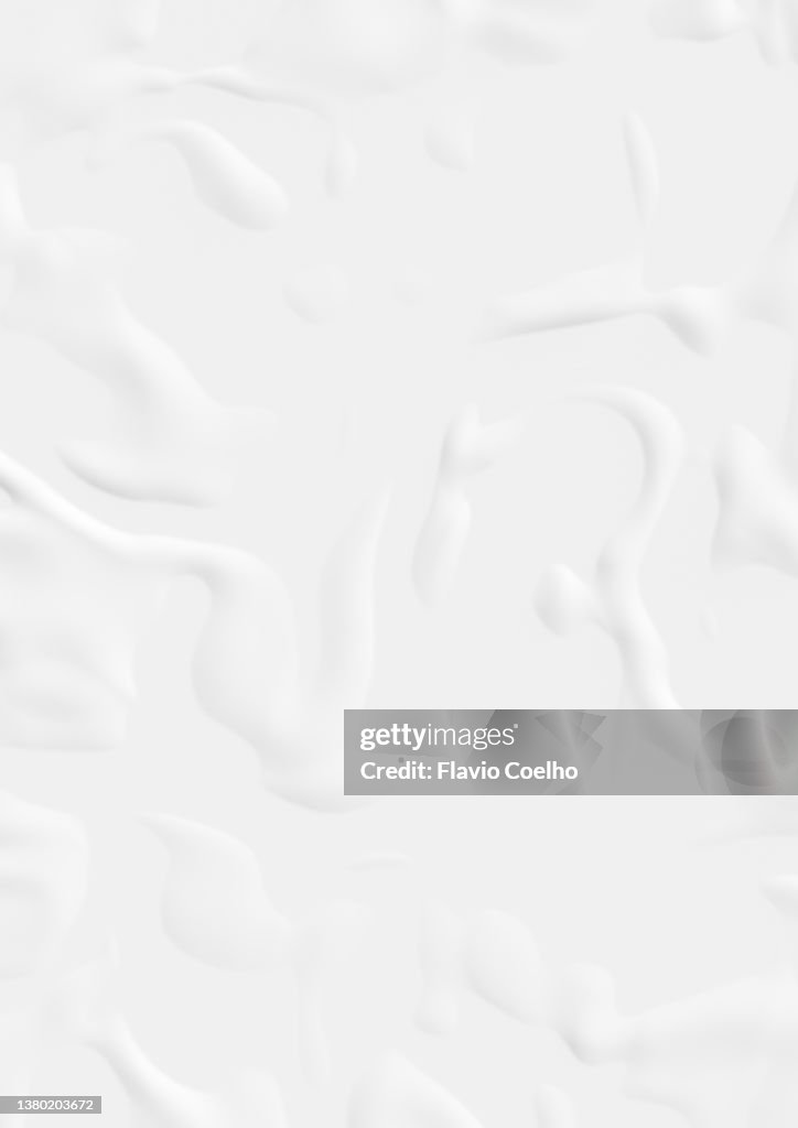 Paper poster glued on surface with bumpy air bubbles