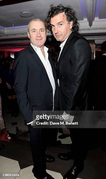 Damien Hirst and Ant Genn attend the Motilo.com Party to celebrate the month of 'Love' at Le Baron At Embassy on January 31, 2012 in London, England.