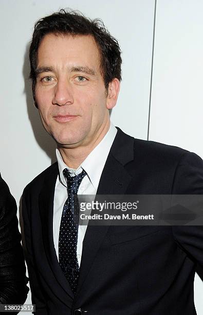 Clive Owen attends a private viewing of "Gaucho", a photographic exhibition by Astrid Munoz, at the Jaeger-LeCoultre Boutique on January 31, 2012 in...