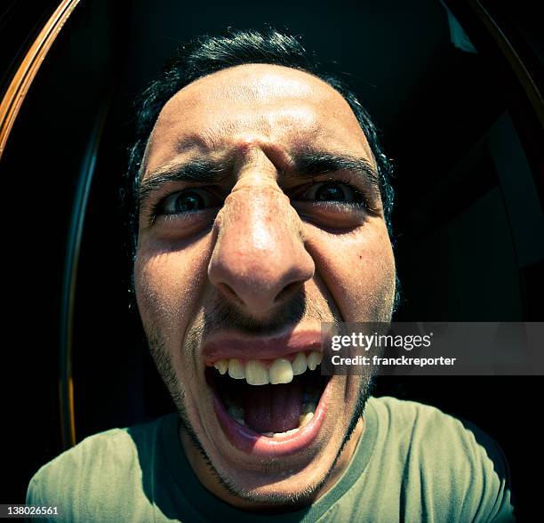 crazy man with strange face portrait , fisheye lens - big nose 個照片及圖片檔