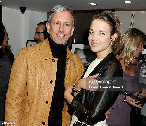 Patrick Cox and Natalia Vodianova attend a private viewing of "Gaucho", a photographic exhibition by Astrid Munoz, at the Jaeger-LeCoultre Boutique...