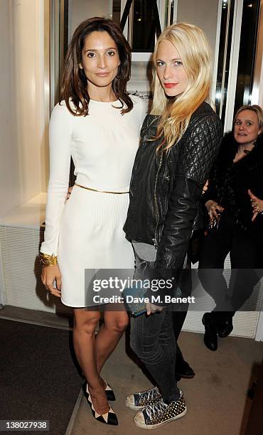 Astrid Munoz and Poppy Delevingne attend a private viewing of "Gaucho", a photographic exhibition by Astrid Munoz, at the Jaeger-LeCoultre Boutique...