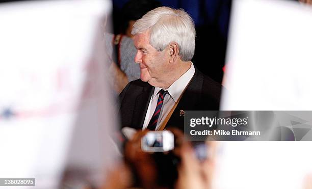 Republican presidential candidate, former Speaker of the House Newt Gingrich attends his Florida primary night party January 31, 2012 in Orlando,...