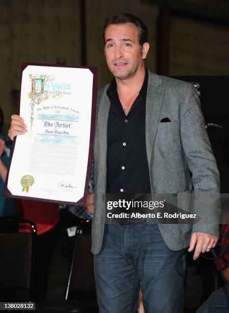 Actor Jean Dujardin attends the Inaugural presentation of the Los Angeles City Council's "Made in Hollywood" commendation presented to the cast of...