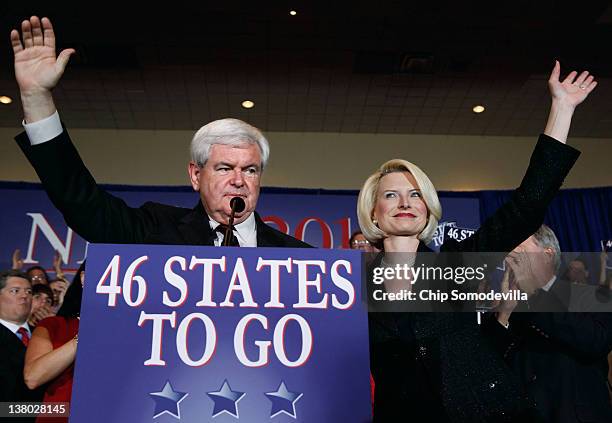 Republican presidential candidate, former Speaker of the House Newt Gingrich and his wife Callista Gingrich wave to supporters during his Florida...