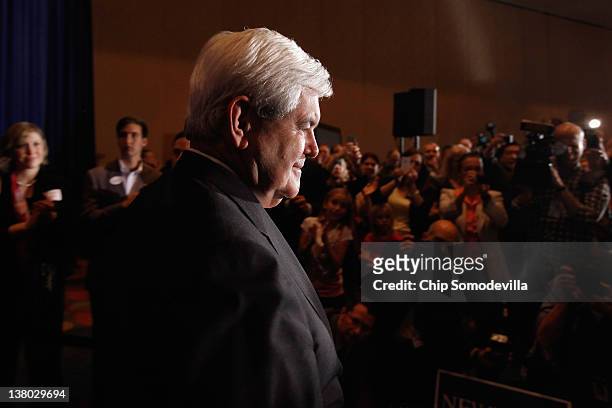Republican presidential candidate, former Speaker of the House Newt Gingrich arrives for his Florida primary night party January 31, 2012 in Orlando,...