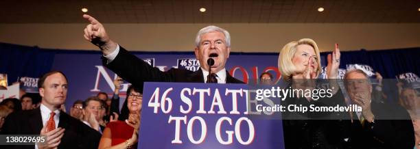 Republican presidential candidate, former Speaker of the House Newt Gingrich speaks as his wife Callista looks on during his Florida primary night...