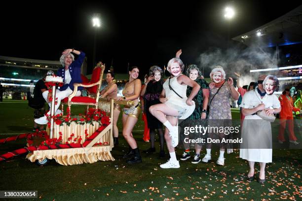 Parade goers march inside the Sydney Cricket Ground during the 44th Sydney Gay and Lesbian Mardi Gras Parade on March 05, 2022 in Sydney, Australia....