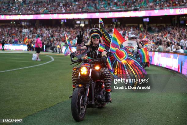 Parade goers ride inside the Sydney Cricket Ground during the 44th Sydney Gay and Lesbian Mardi Gras Parade on March 05, 2022 in Sydney, Australia....