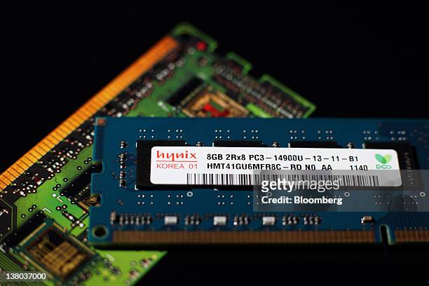 Hynix Semiconductor Inc. 8GB Double-Data-Rate 3 UDIMM memory chip is arranged for a photograph at the company's office in Seoul, South Korea, on...
