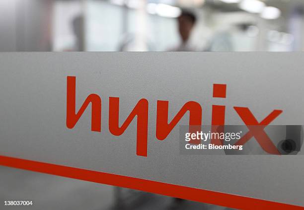 The Hynix Semiconductor Inc. Logo is displayed in the company's office in Seoul, South Korea, on Wednesday, Feb. 1, 2012. Hynix Semiconductor Inc. Is...