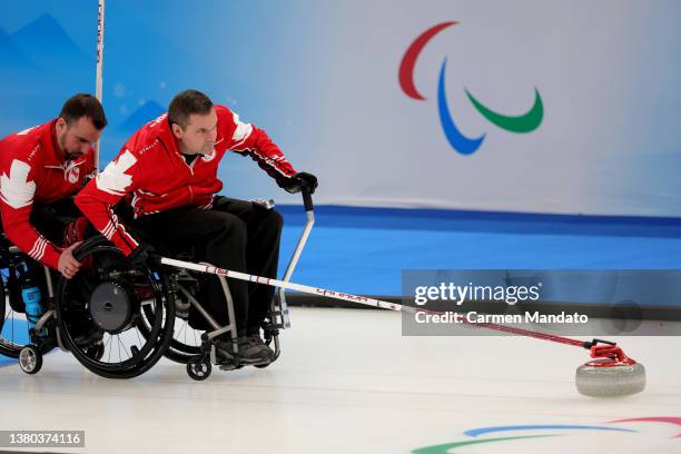 Mark Ideson of Team Canada competes against Team Switzerland at the National Aquatics Center during Day One of the Beijing 2022 Winter Paralympics at...