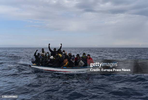 Migrants in a wooden boat, which left the coast of Libya, are waiting to be rescued by members of the NGO Open Arms, March 5 off the coast of Libya,...