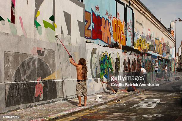 The english graffiti artist "Zase".A general view of graffiti street art covering the main wall of the old Central Bus station at Rue des Pyrenees on...