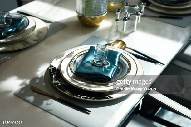 neatly arranged cutlery on the table - restaurant chic stock pictures, royalty-free photos & images