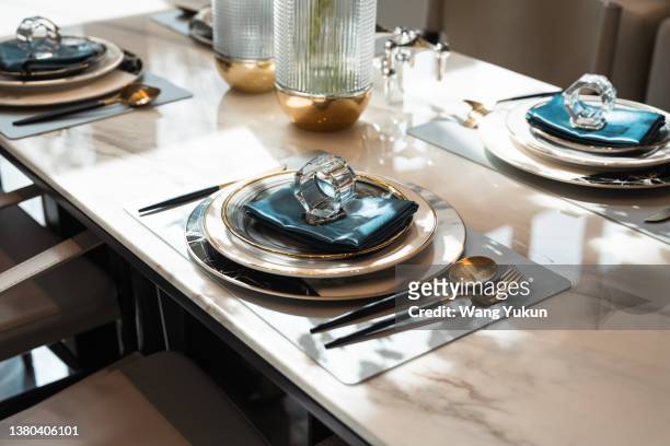 neatly arranged cutlery on the table - luxury table setting stock pictures, royalty-free photos & images