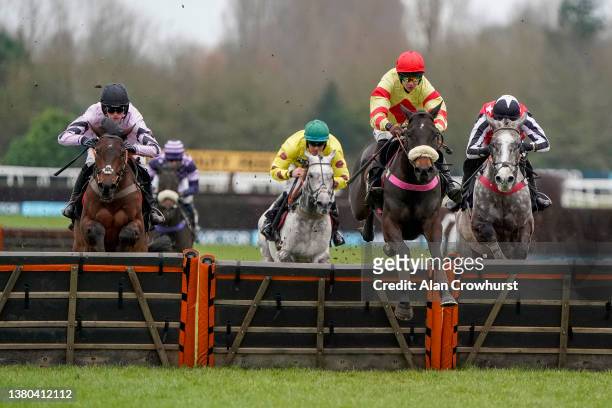 Brendan Powell riding Black Poppy clear the last to win The Make Your Best Bet At BetVictor Handicap Hurdle at Newbury Racecourse on March 05, 2022...