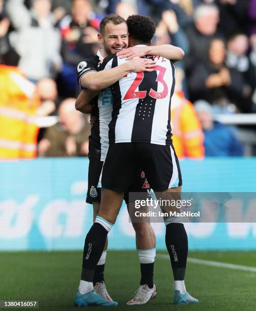 Ryan Fraser celebrates with Jacob Murphy of Newcastle United after scoring their team's first goal during the Premier League match between Newcastle...
