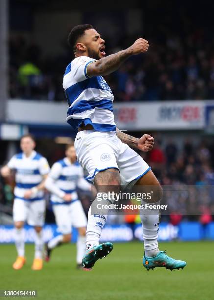 Andre Gray of Queens Park Rangers celebrates after scoring their team's first goal during the Sky Bet Championship match between Queens Park Rangers...