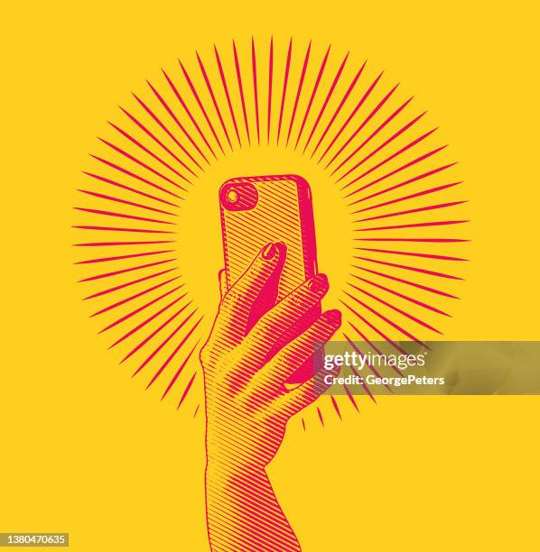 woman's hand holding smart phone - selfie stock illustrations