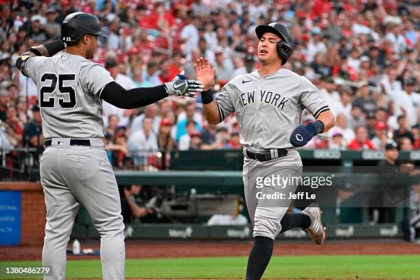 Anthony Volpe of the New York Yankees scores against the St. Louis Cardinals in the second inning during game 2 of a doubleheader at Busch Stadium on...