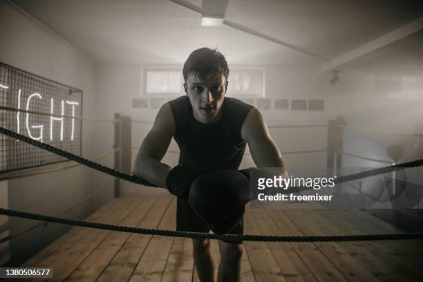 sweaty boxer - mma ring stock pictures, royalty-free photos & images