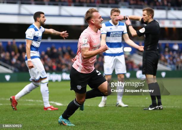 Isaak Davies of Cardiff City celebrates after scoring their team's first goal during the Sky Bet Championship match between Queens Park Rangers and...