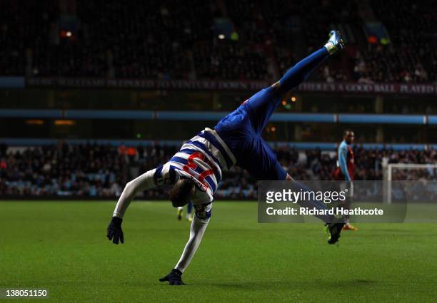 Djibril Cisse of QPR celebrates scoring the opening goal during the Barclays Premier League match between Aston Villa and Queens Park Rangers at...