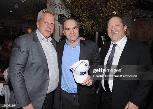 Steve Tisch, Bob Weinstein and Harvey Weinstein attend the New York Giants Super Bowl Pep Rally Luncheon at Michael's on February 1, 2012 in New York...