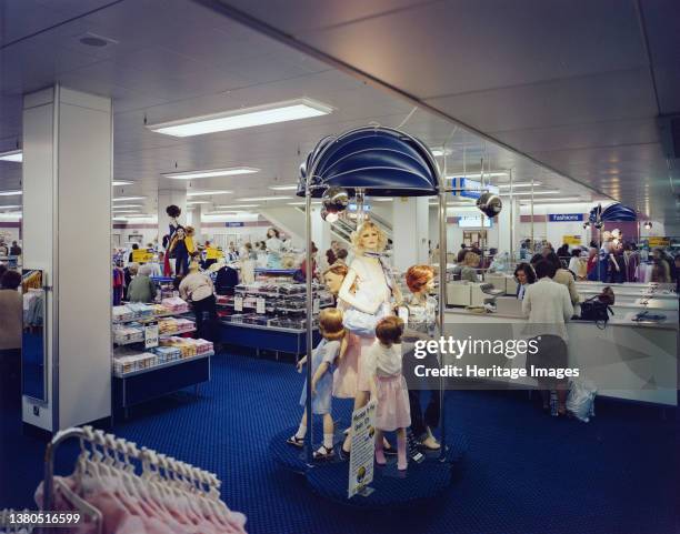 Queensgate Centre, Peterborough, Cambridgeshire, . An interior view of British Home Stores within Queensgate Shopping Centre, showing clothing...