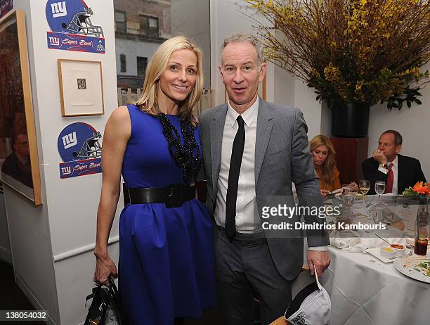 Jamie Tisch and John McEnroe attend the New York Giants Super Bowl Pep Rally Luncheon at Michael's on February 1, 2012 in New York City.