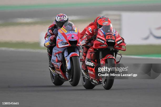 Francesco Bagnaia of Italy and Ducati Lenovo Team leads Enea Bastianini of Italy and Gresini Racing MotoGP during the MotoGP of Qatar - Qualifying at...