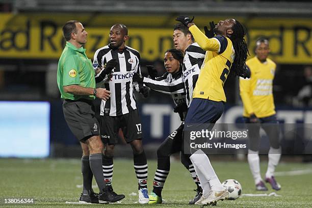 Referee Ruud Bossen,Kwame Quansah of Heracles Almelo,Everton Ramos da Silva of Heracles Almelo,Evander Sno of RKC Waalwijk during the Dutch Cup match...