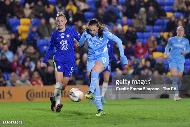 Caroline Weir of Manchester City scores their team's first goal past Sophie Ingle of Chelsea during the FA Women's Continental Tyres League Cup Final...
