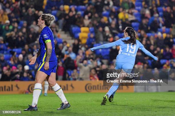 Caroline Weir of Manchester City celebrates after scoring their team's first goal as Millie Bright of Chelsea reacts during the FA Women's...