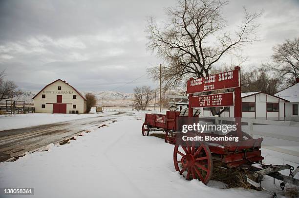 Maggie Creek Ranch signage is displayed on an old wagon at the entrance to the property in Elko, Nevada, U.S., on Wednesday, Jan. 25, 2012. The...
