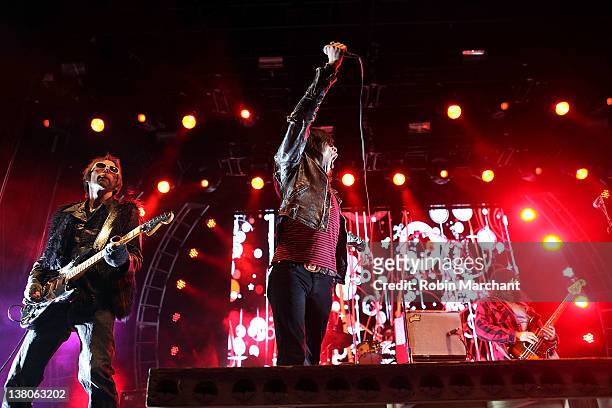 Mike Puwal, Brent James and Jason Kott of Brent James & The Contraband performs during day 6 of the Super Bowl Village on February 1, 2012 in...