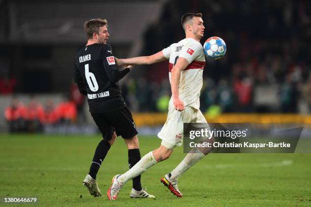 Sasa Kalajdzic of Stuttgart tackles with Christoph Kramer of Borussia Monchengladbach during the Bundesliga match between VfB Stuttgart and Borussia...