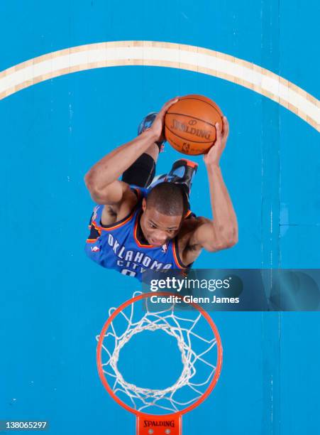 Russell Westbrook of the Oklahoma City Thunder flies in for the dunk against the Dallas Mavericks on February 1, 2012 at the American Airlines Center...