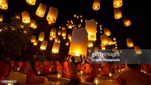 thai buddhist monks float lanterns - thailand illumination festival bildbanksfoton och bilder