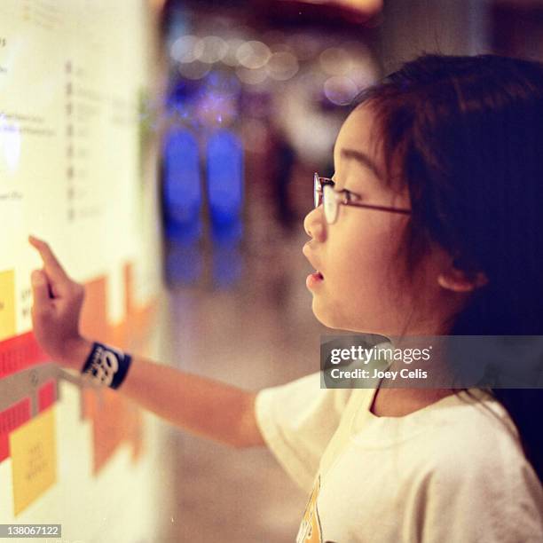 child points at map in mall - las vegas map stock pictures, royalty-free photos & images