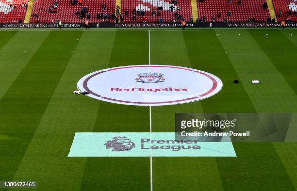 Red Together centre circle flag in the middle of the pitch before the Premier League match between Liverpool and West Ham United at Anfield on March...