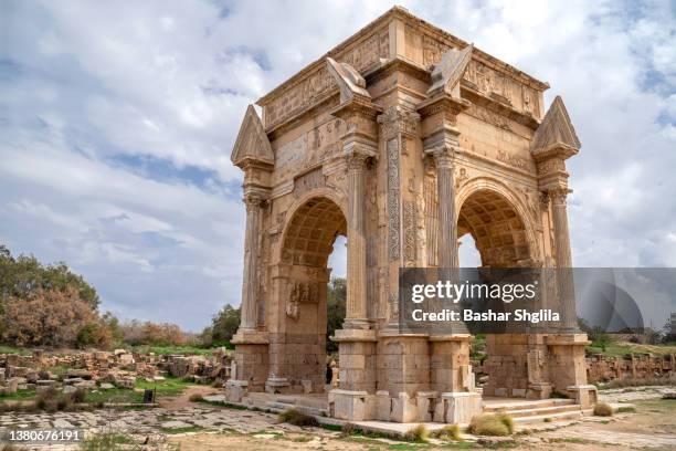 septimius severus's arch - ruins of leptis magna stock pictures, royalty-free photos & images