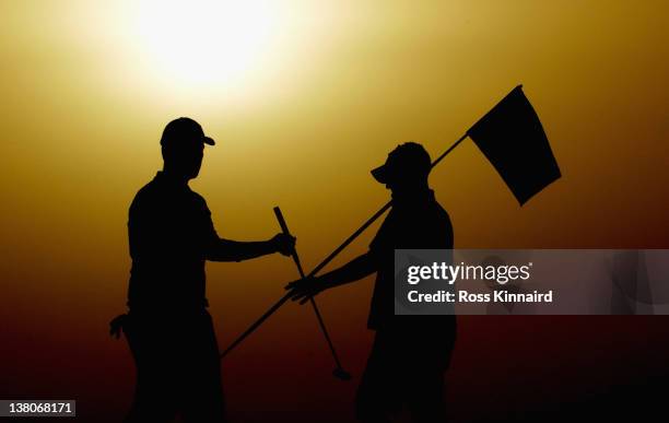 Mark Foster of England on the 10th green during the first round of the Commercialbank Qatar Masters at the Doha Golf Club on February 2, 2012 in...