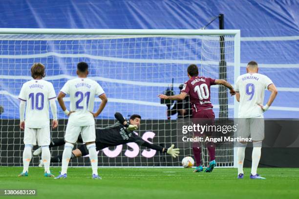 Mikel Oyarzabal of Real Sociedad scores from penalty spot their team's first goal during the LaLiga Santander match between Real Madrid CF and Real...