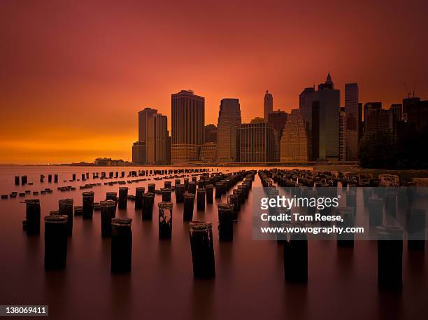 new york city skyline from pier, brooklyn - wowography stock pictures, royalty-free photos & images